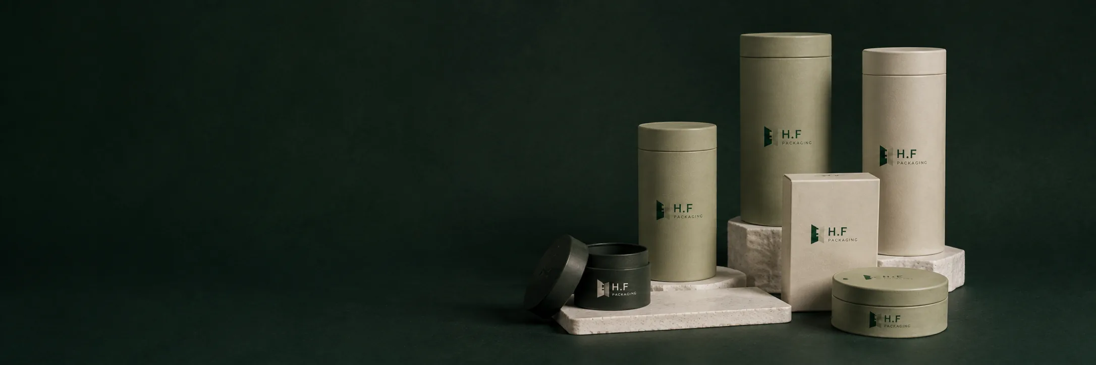 H.F Packaging paper tubes and rigid gift boxes in sage green and ivory