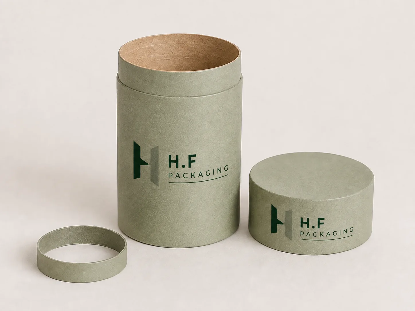 Sage green H.F Packaging tube and lid with a separate paperboard insert